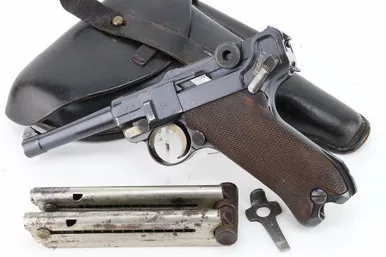 SOLD - DWM Police Reworked Luger Rig - Matching Magazine, Holster, and Tool