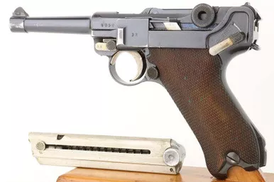 SOLD - Scarce DWM "Sneak" Luger - Matching Magazine