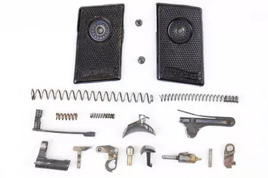 SOLD - Walther Model 9 Grips and Small Parts